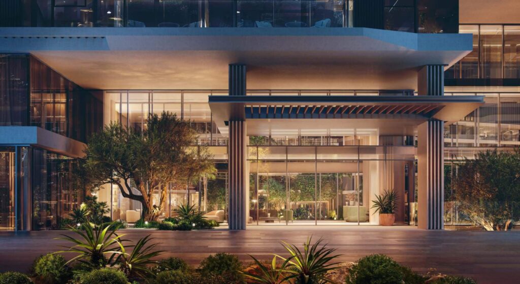 2 Bedroom Properties for Sale in Palm Jebel Ali: Lobby entrance with tropical planting at night at Palm Central, Palm Jebel Ali, Dubai