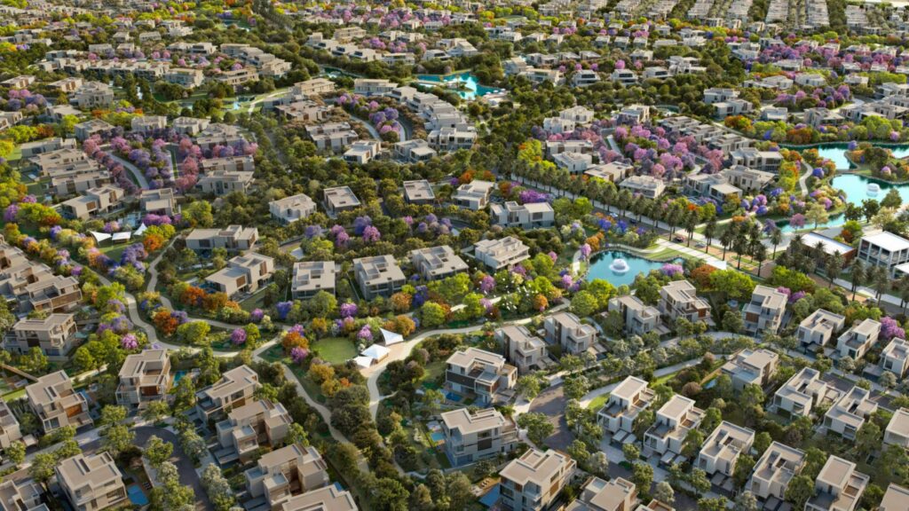 3 Bedroom Properties for Sale in Dubailand: Aerial view across the villa community with streets, parks and lagoons at The Acres, Dubailand, Dubai