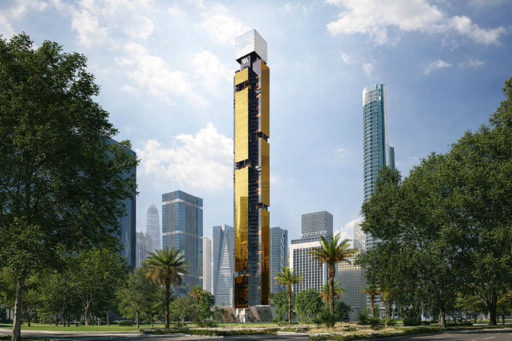 Slender tower with gold facade among trees, imagery for Waldorf Astoria Residences, Business Bay