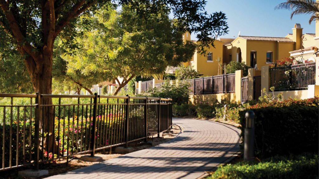 Shaded community walkway with railings at Arabian Ranches, Dubailand