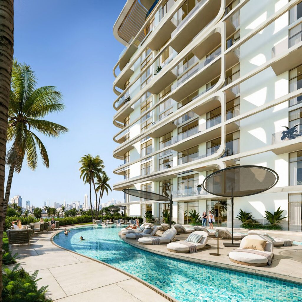 Arka Enclave building beside a lagoon pool with palms, Dubai Islands