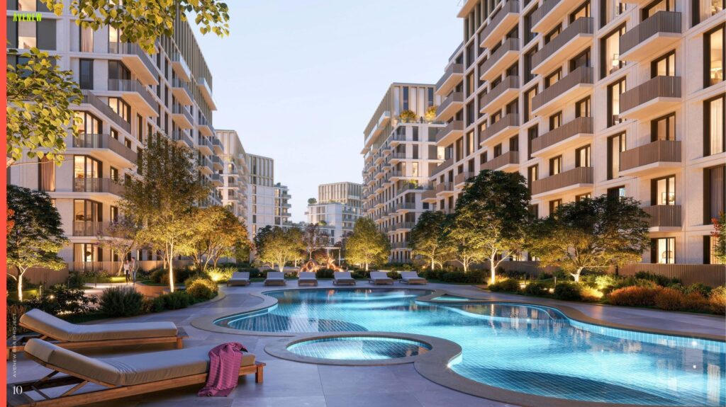 Courtyard pool between the Avenew 888 LOOM buildings at dusk, Dubai South