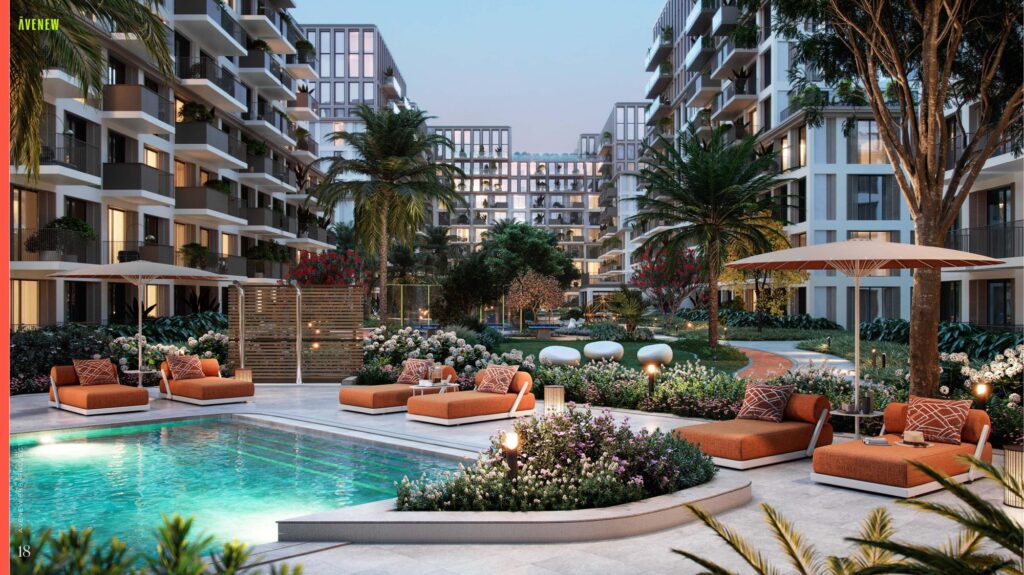 Pool deck with loungers among the Avenew 888 LOOM buildings, Dubai South