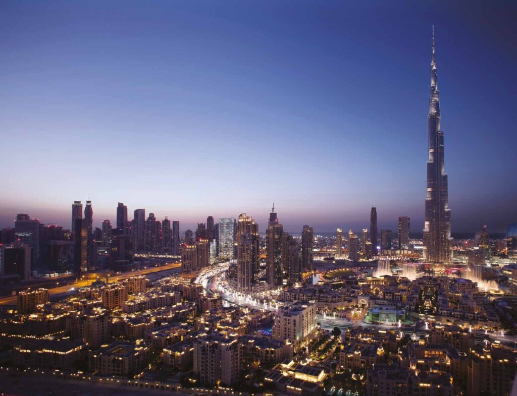 Downtown Dubai and the Burj Khalifa at dusk near BLVD Crescent