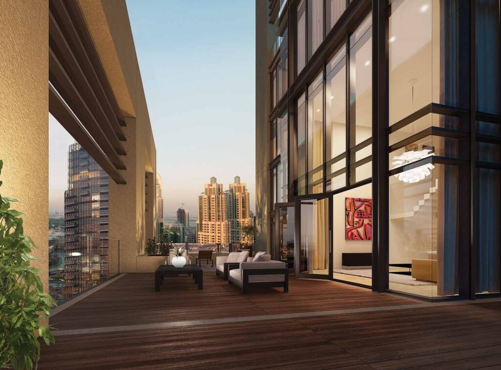 Terrace with lounge chairs and city view at BLVD Heights, Downtown Dubai