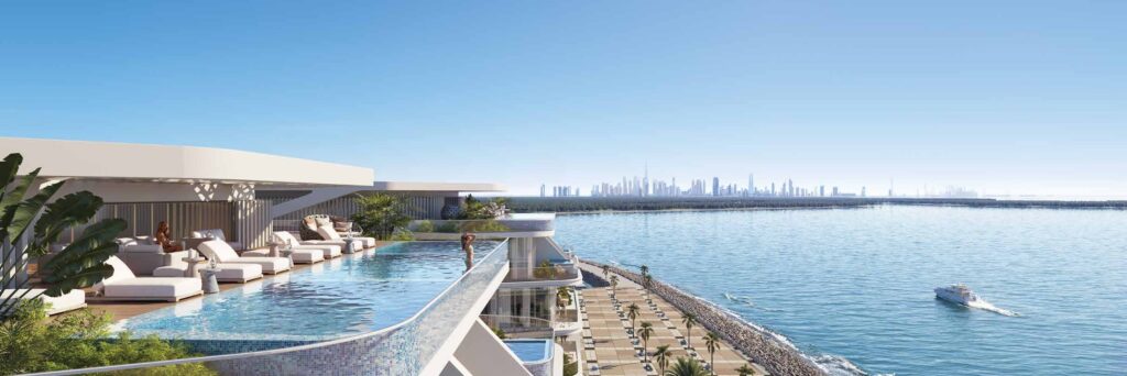 Rooftop infinity pool facing the sea at Hatimi Residences