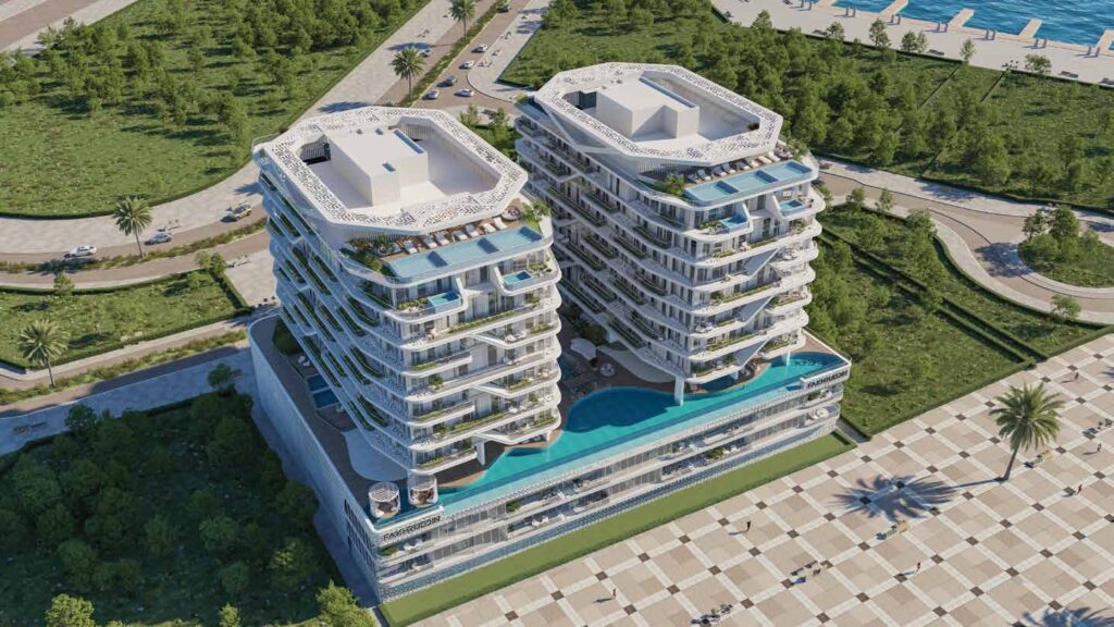Aerial view of the twin Hatimi Residences buildings and pools