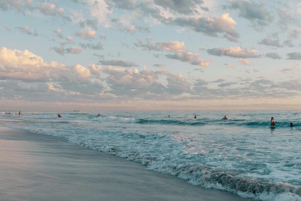 Waves on the beach at sunset near Iluka Residences, Dubai Islands