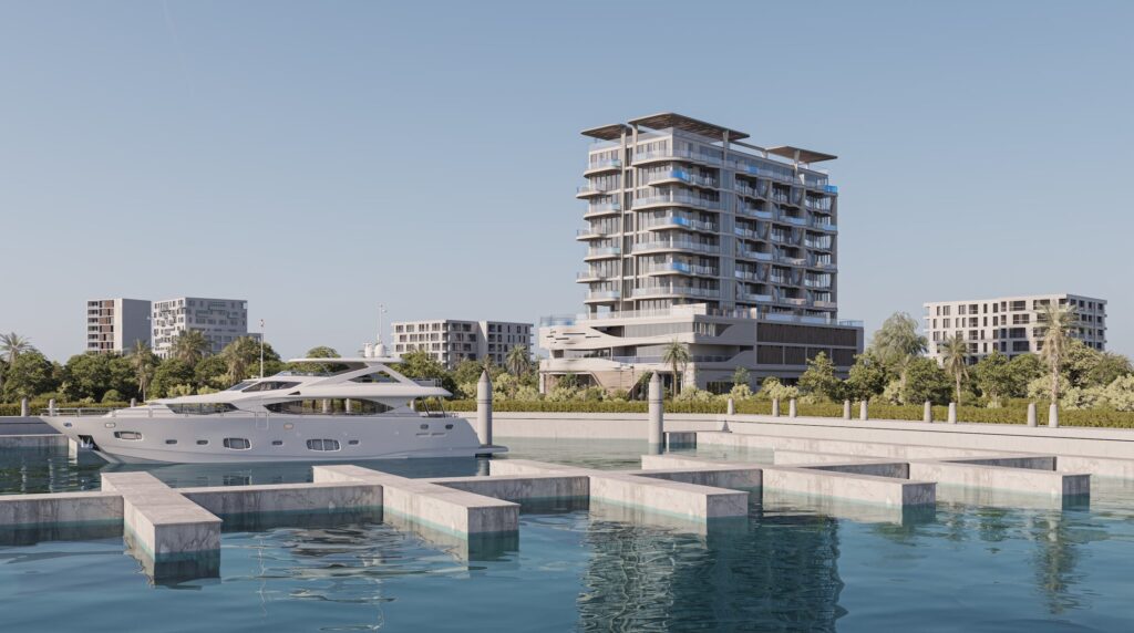 Iluka Residences building beside a marina with a yacht, Dubai Islands