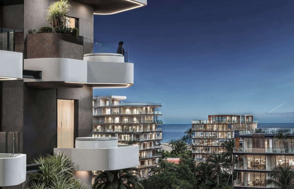 Planted balconies of Marea Residences with sea views at night