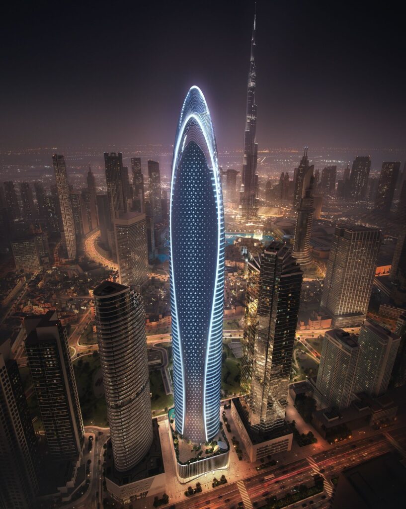 Mercedes Benz Places by Binghatti tower glowing among Downtown towers at night