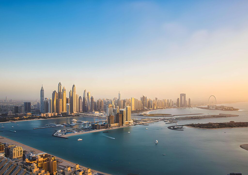 Dubai Marina skyline and Palm Jumeirah across the sea from Nautis Residences