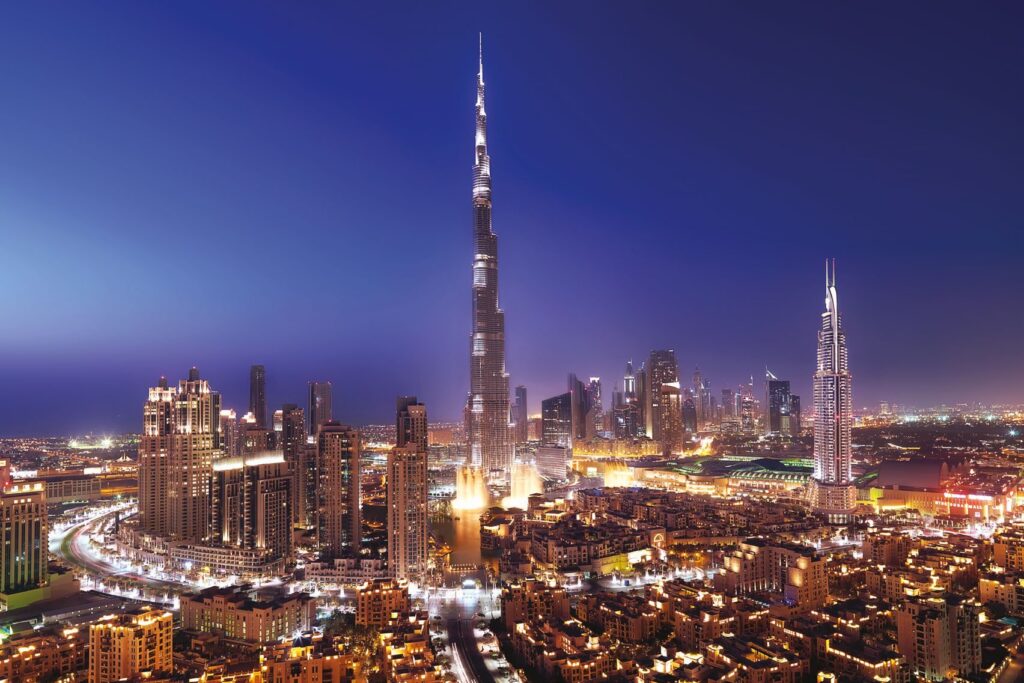 Burj Khalifa and Downtown towers at dusk around Opera Grand, Downtown Dubai
