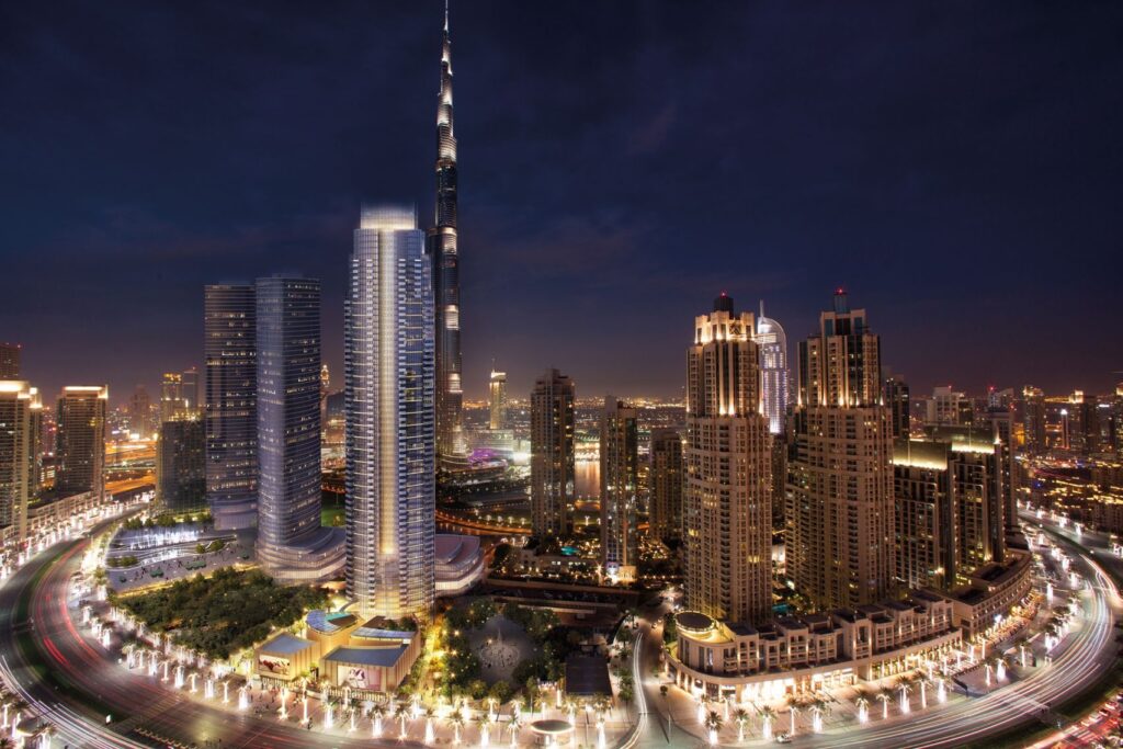 Illuminated Downtown Dubai skyline with Opera Grand at night