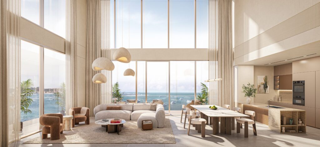 Double height lounge with dining area at SOMA Residences, Dubai Islands