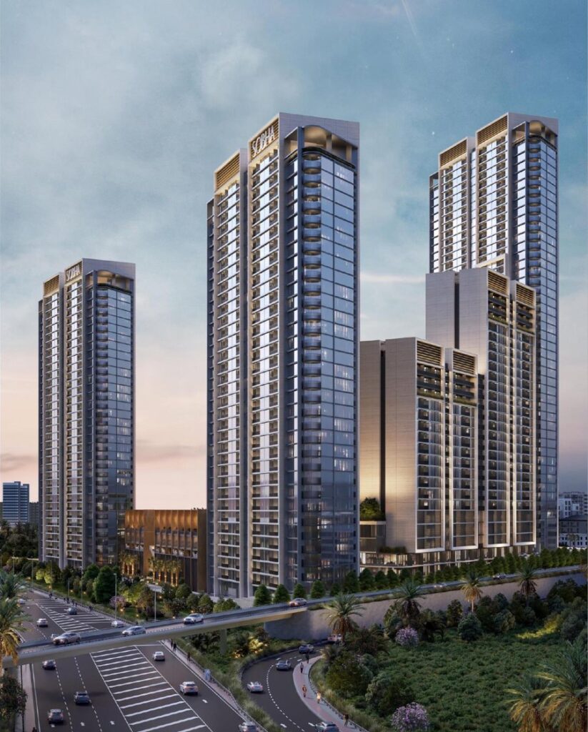 Sobha Orbis towers at sunset with green surroundings, Motor City, Dubai