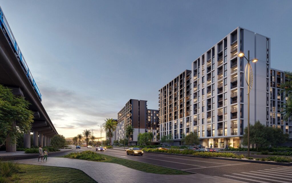 Terra Gardens residential blocks along a landscaped boulevard, Dubai South