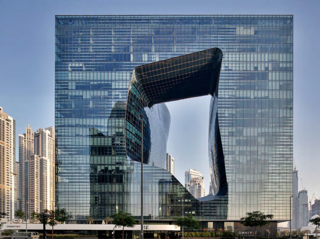 Front view of the The Opus by Omniyat glass facade and void, Business Bay