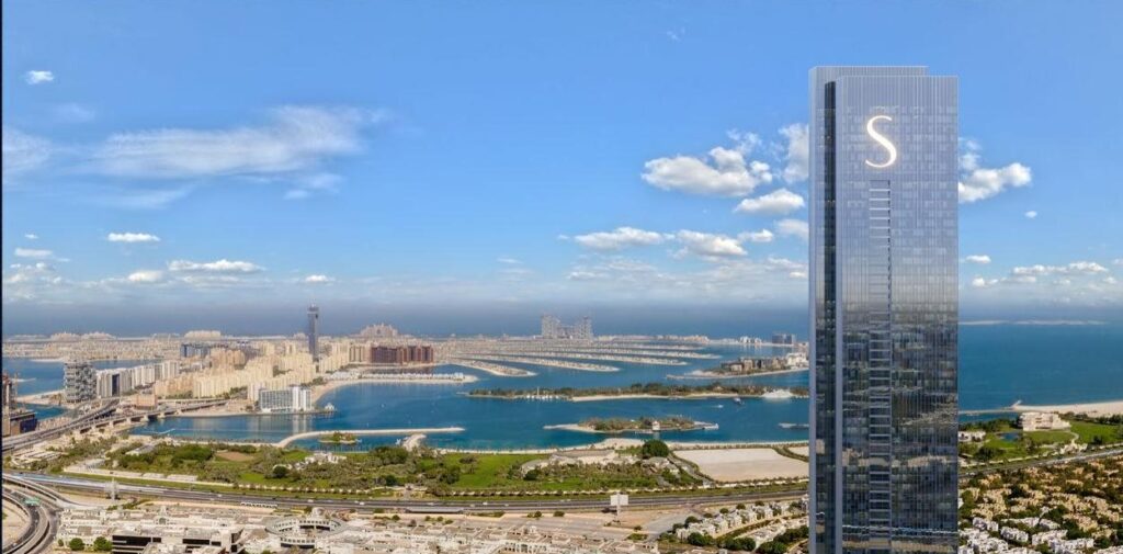 The S Tower by Sobha tower with Palm Jumeirah and the sea beyond, Dubai