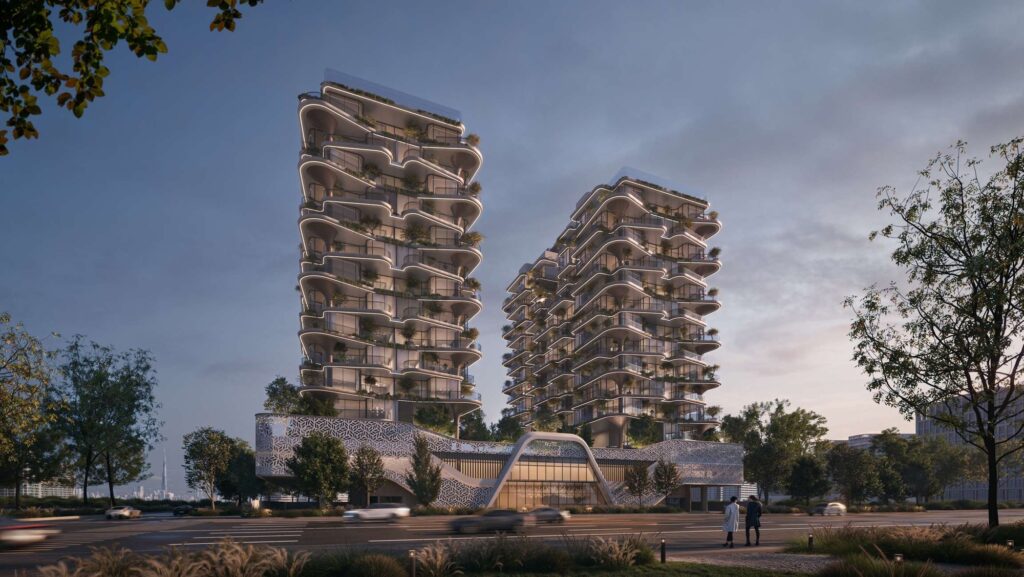 Twin sculpted towers of Treppan Serenique Residences at dusk with landscaped grounds, Dubai Islands