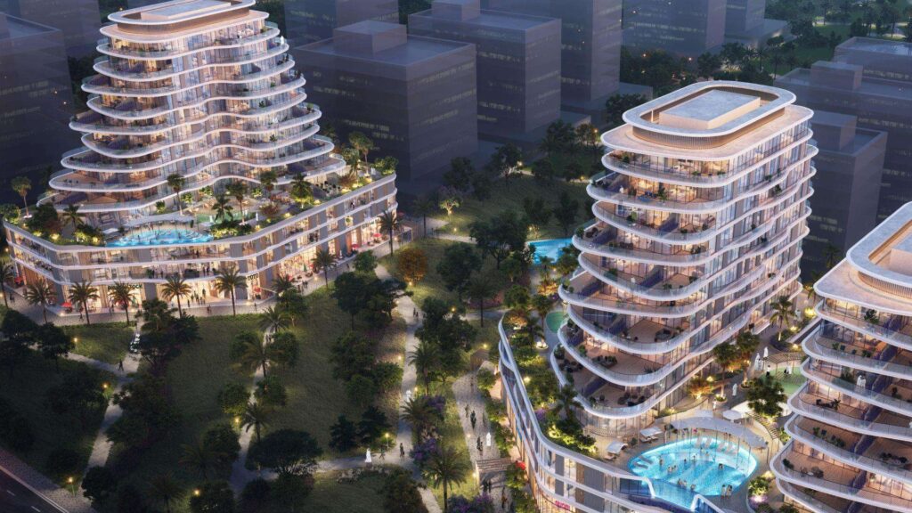 Aerial night view of the Zephyra Residences buildings and pools, Dubai Islands