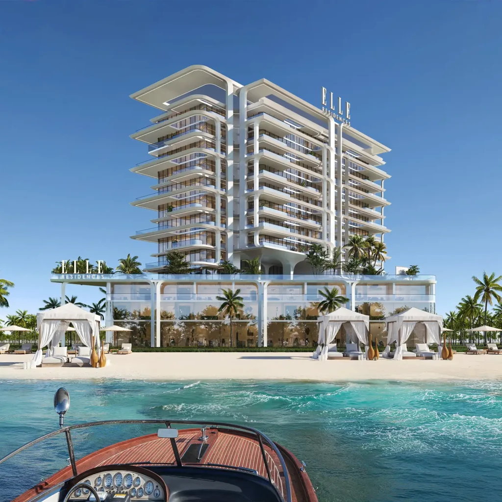 Elle Residences seen from the water with beach cabanas