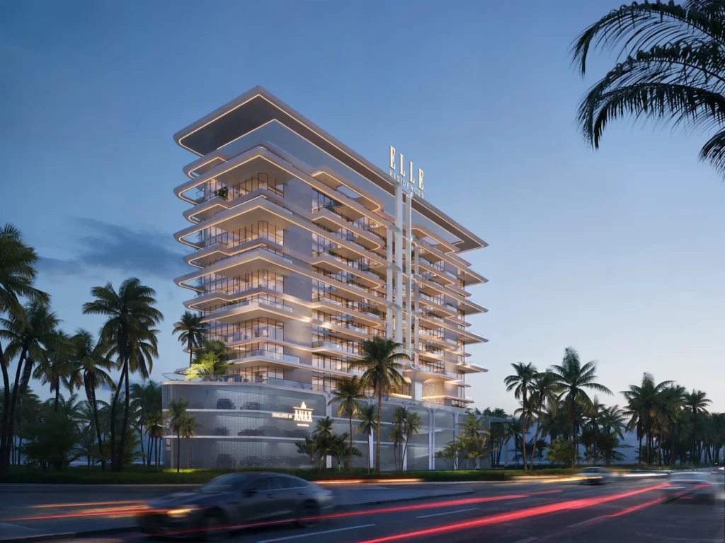 Elle Residences lit up at dusk beside palms, Dubai Islands