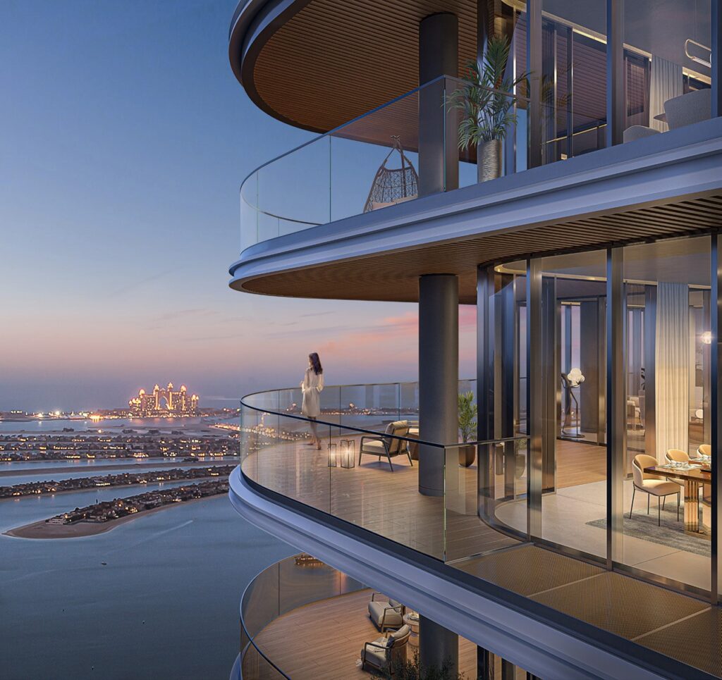 Curved glass balcony overlooking the sea at dusk at Bayview by Address Resorts, Dubai Harbour