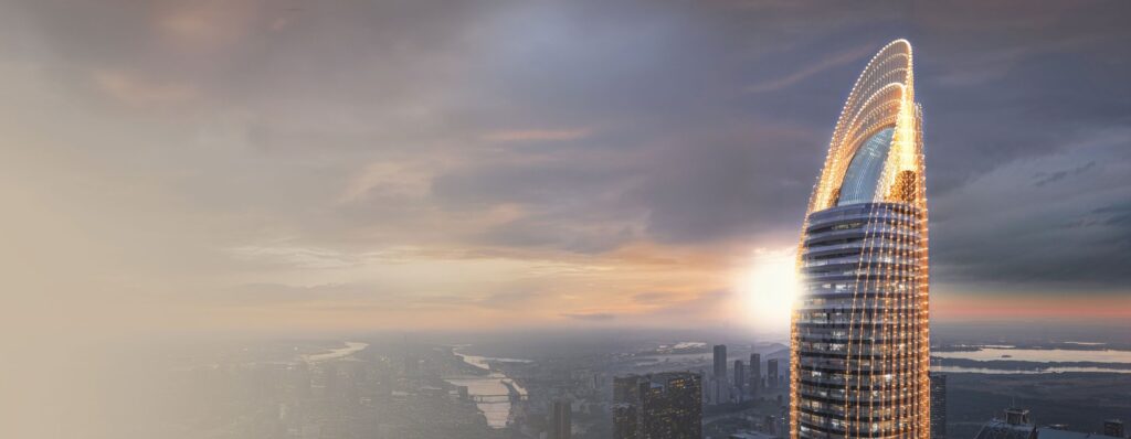 Tower crown with blade shaped top glowing at sunset at Binghatti Skyblade, Downtown Dubai