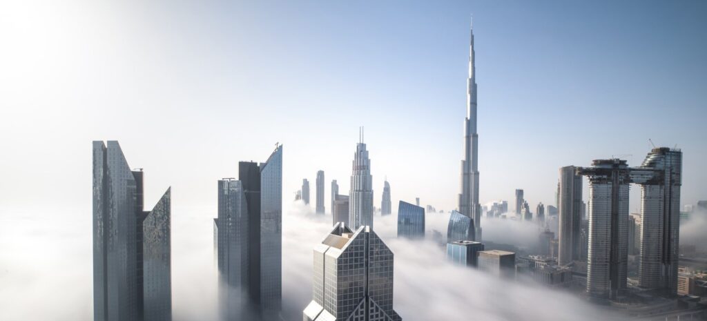 Downtown Dubai towers above the clouds, skyline imagery for Clearpoint by Emaar