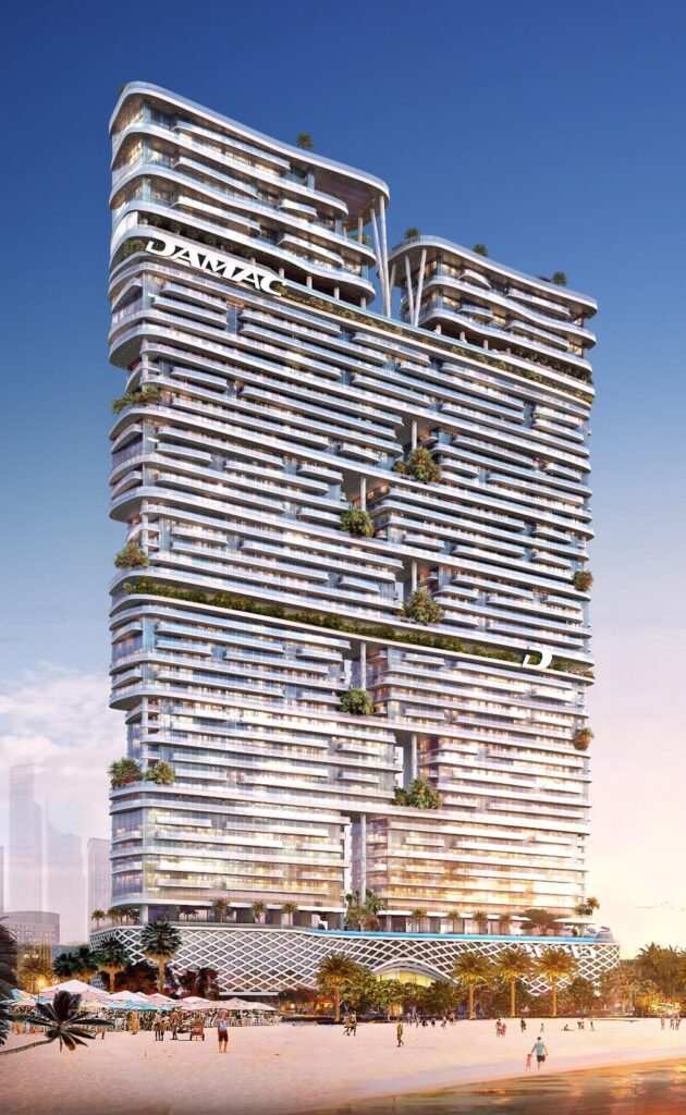 Slender residential tower with terraced balconies against a clear sky at DAMAC Bay 2, Dubai Harbour