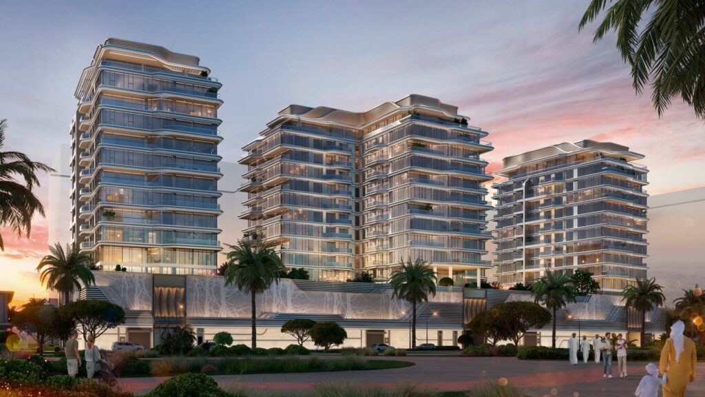 Edgewater Residences towers at sunset above palm lined gardens, Dubai Islands