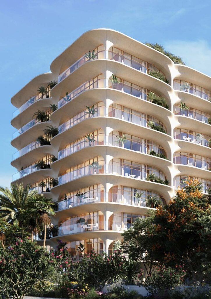 Ellington Ocean House building with flowing white balconies among palms, Palm Jumeirah