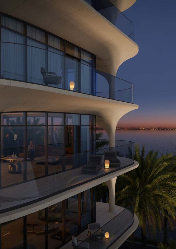 Balconies and lit interiors of Ellington Ocean House at twilight, Palm Jumeirah