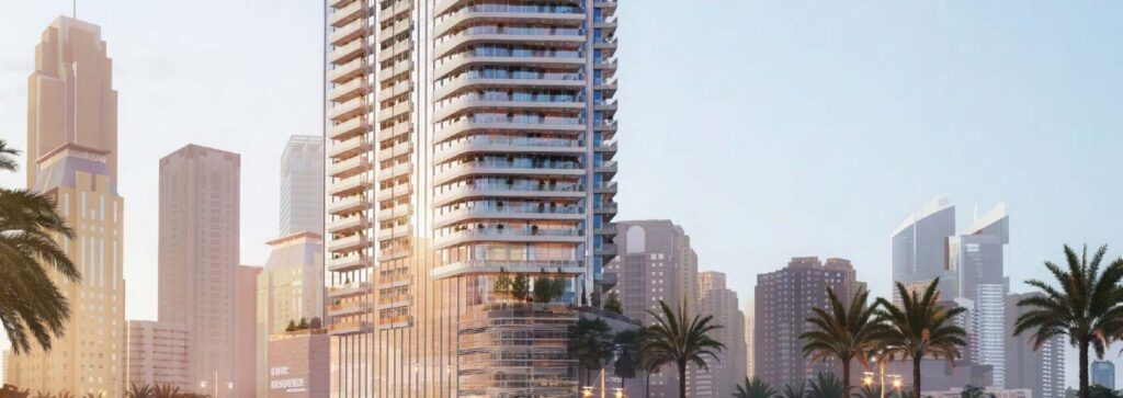 Habtoor Grand Residences tower among palm trees and the JBR skyline, Dubai Marina