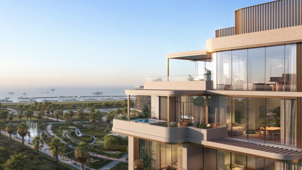 Glass balconies of House of Well overlooking palm gardens and the coast, Dubai Islands