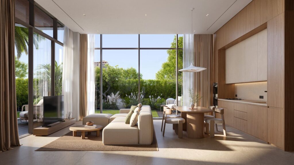 Double height living room with garden views at House of Well, Dubai Islands