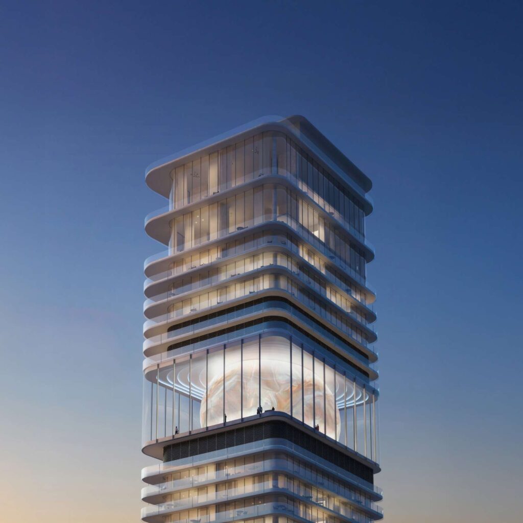 Inaura Hotels and Residences tower with glowing sky levels at dusk, Downtown Dubai