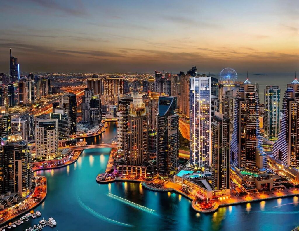 Dubai Marina lit at dusk around LIV Marina