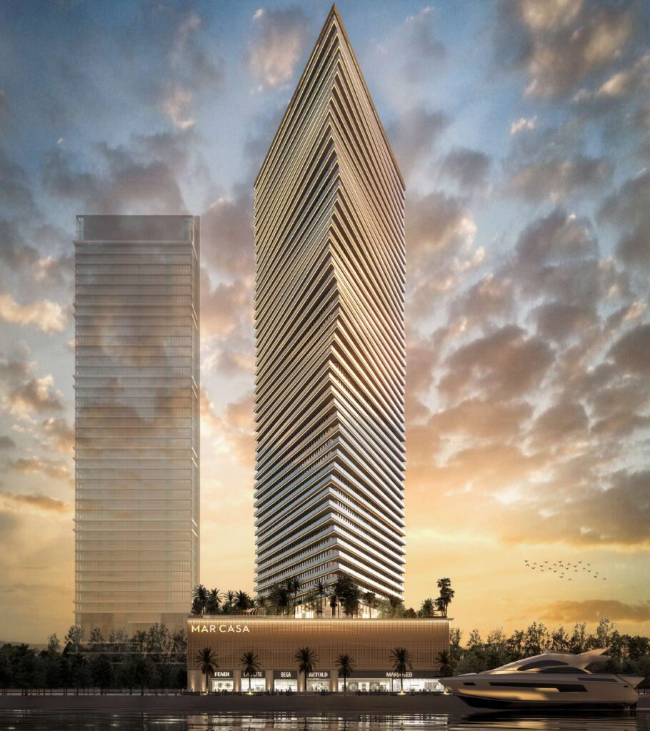 Sail shaped Mar Casa tower at sunset, Dubai Maritime City