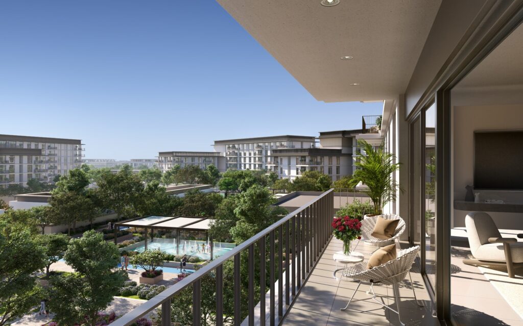 Terrace with lounge chair over landscaped gardens at Ocean Point by Emaar, Rashid Yachts and Marina