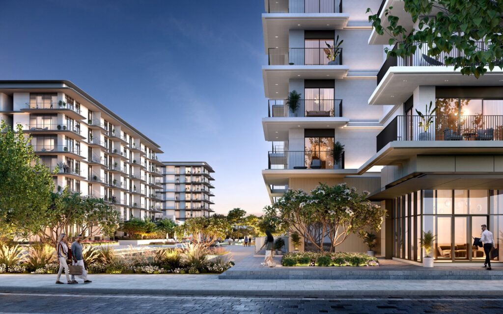 Ocean Point by Emaar residences with planted terraces at dusk, Rashid Yachts and Marina
