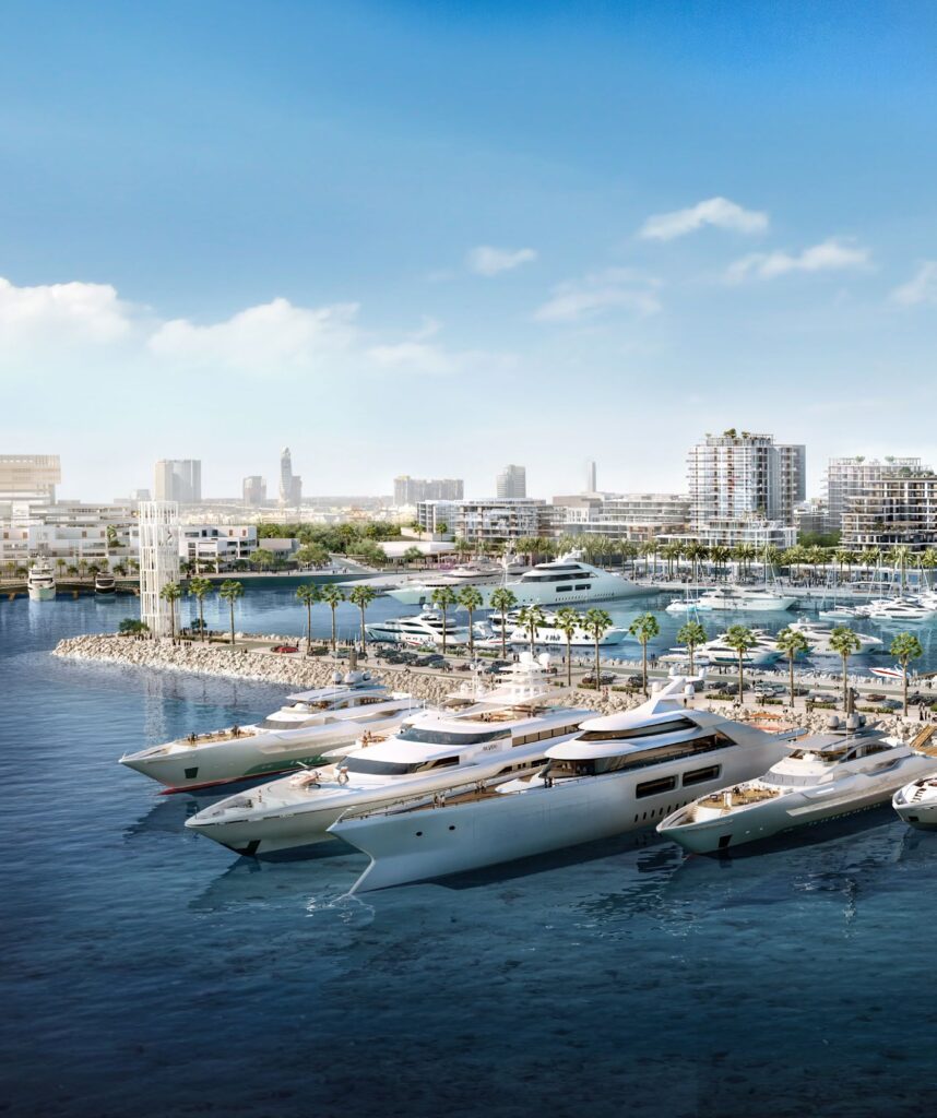 Superyachts moored at Rashid Yachts & Marina with the Dubai skyline behind Ocean Star