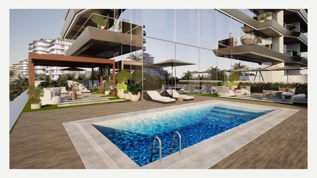 Pool deck with timber decking and planters at Sea Legend Tower One, Dubai Islands