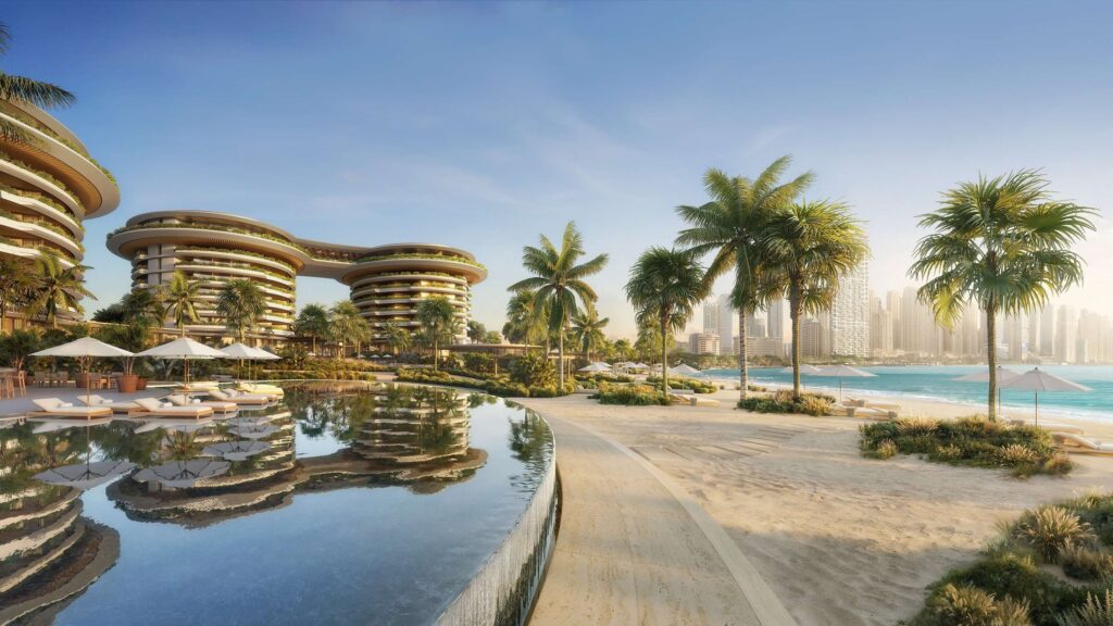 Curved The Residences at The Dubai Beach EDITION buildings above a beachfront pool, Dubai Harbour