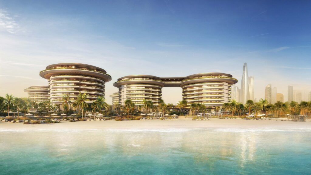 The Residences at The Dubai Beach EDITION towers seen from the sea across the beach, Dubai Harbour