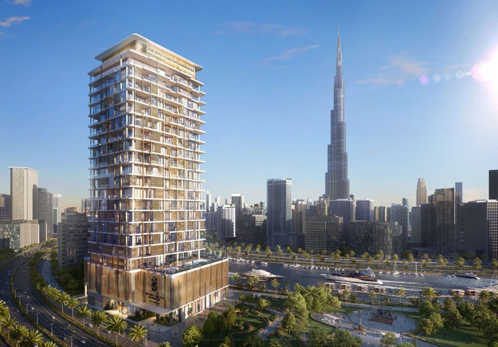 The Ritz Carlton Residences tower beside the canal with Burj Khalifa behind, Business Bay