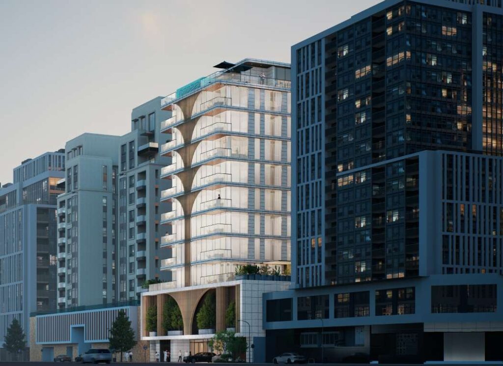 White Stone residential building with arched podium on a city street, Al Wasl, Dubai