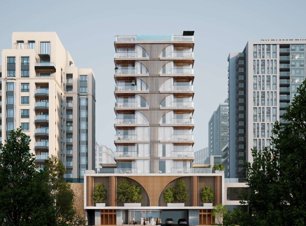 Front elevation of White Stone with arched entrance and mature trees, Al Wasl, Dubai