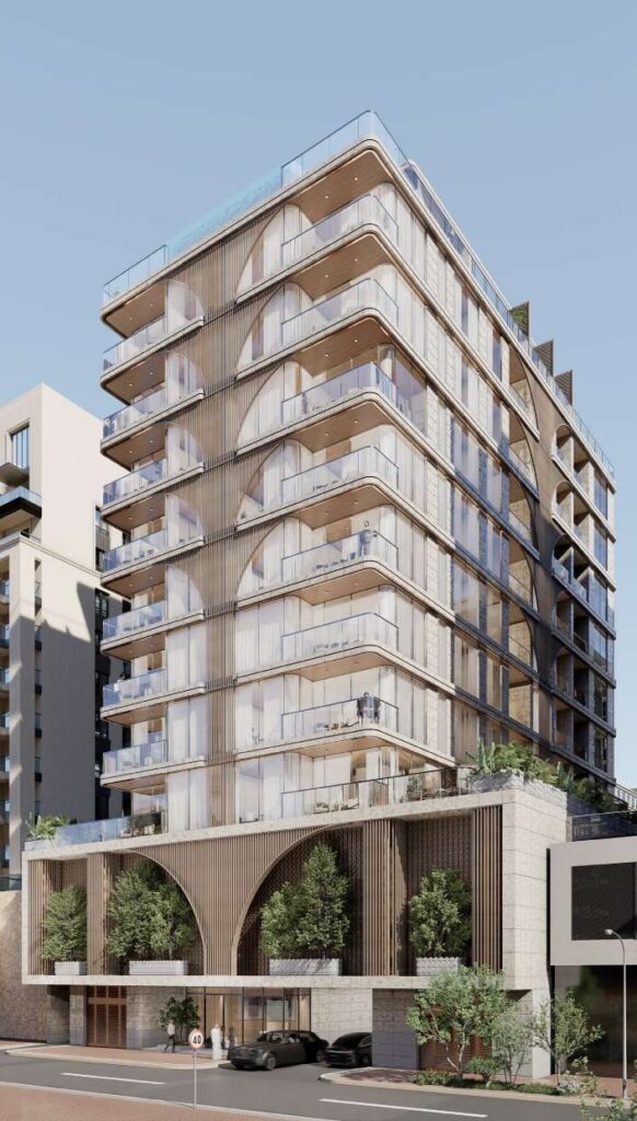 White Stone tower rising above its arched podium at street level, Al Wasl, Dubai